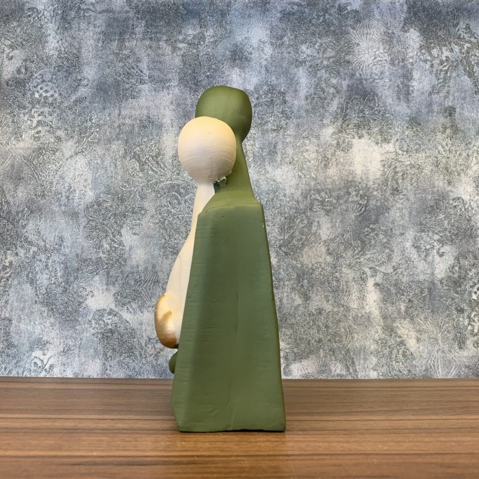 مجسمه دکوری زوج سبز کرم